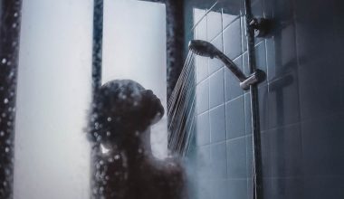 woman under showerhead