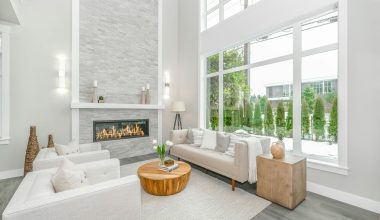 white couch near glass window