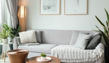 a living room filled with furniture and a large window