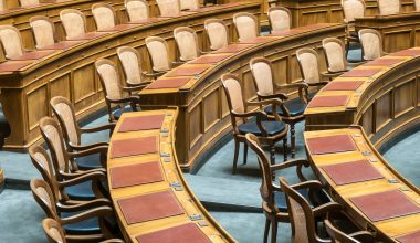 brown wooden chairs on blue and brown wooden floor