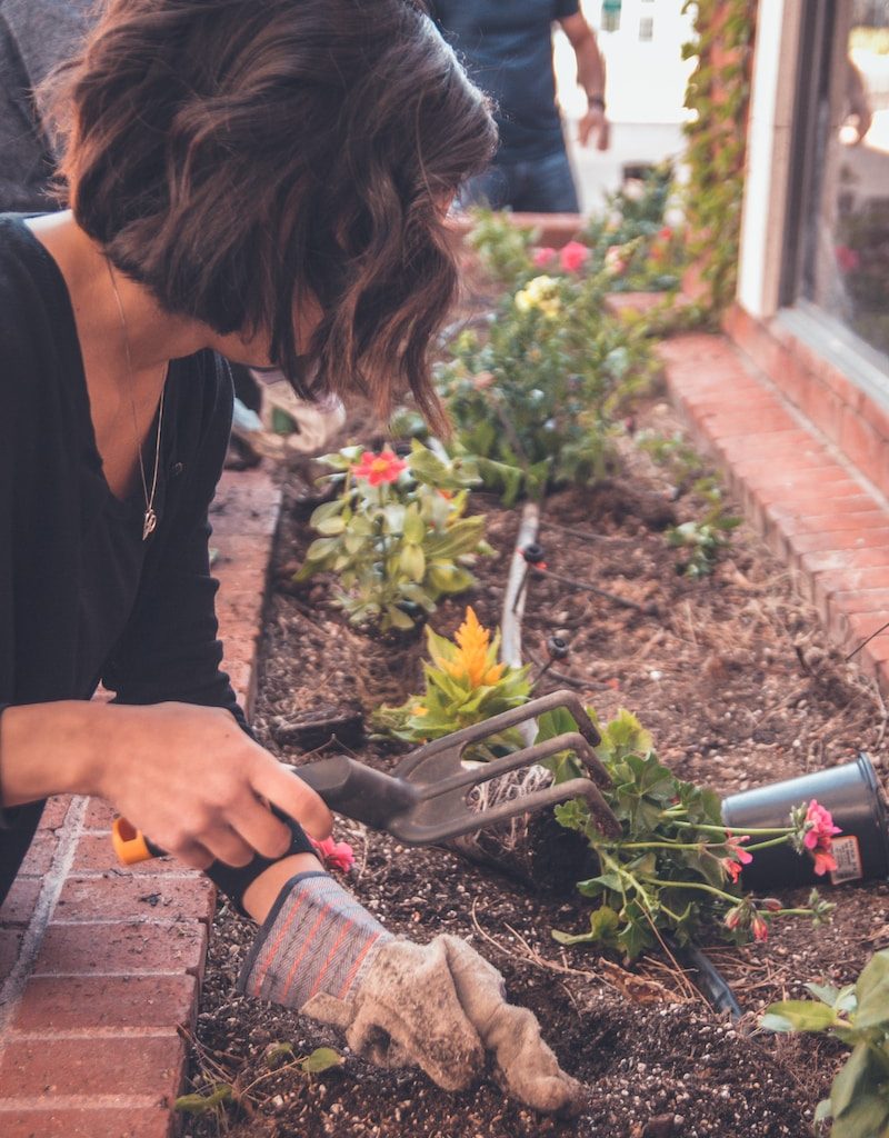 woman holding garden fork