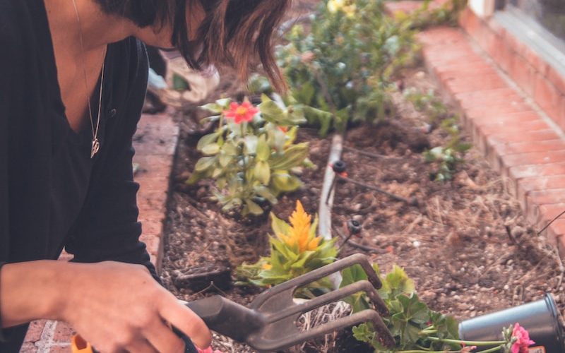 woman holding garden fork