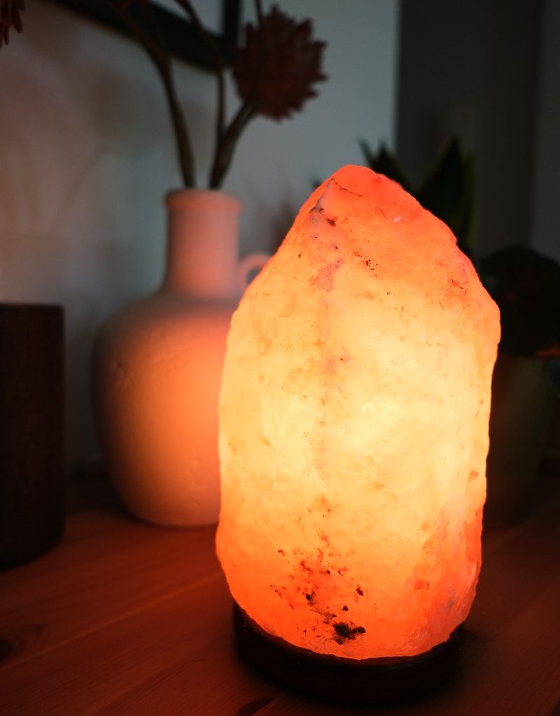 a himalayan salt lamp sitting on a table