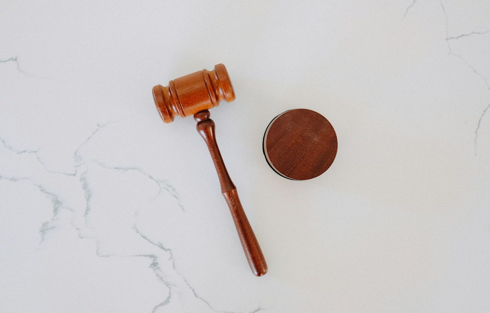 brown wooden smoking pipe on white surface