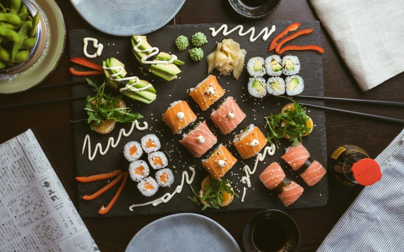 sushi on black ceramic plate