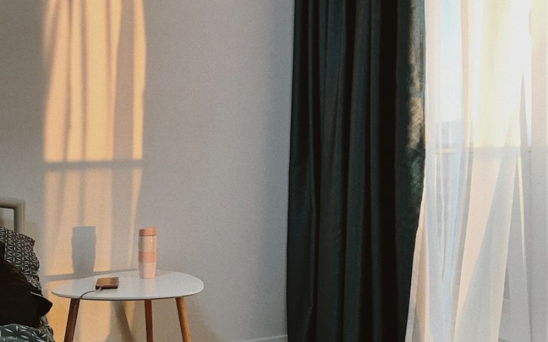 white and brown window curtain