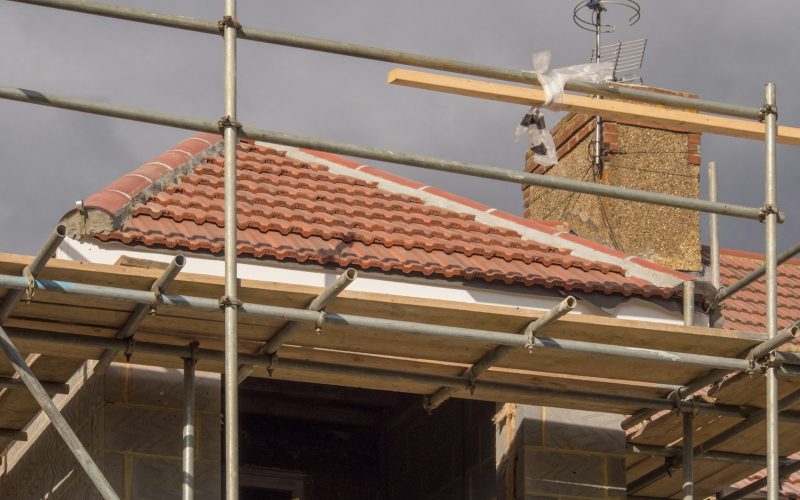 brown roof tiles during daytime