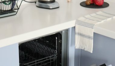 stainless steel kettle on white kitchen counter